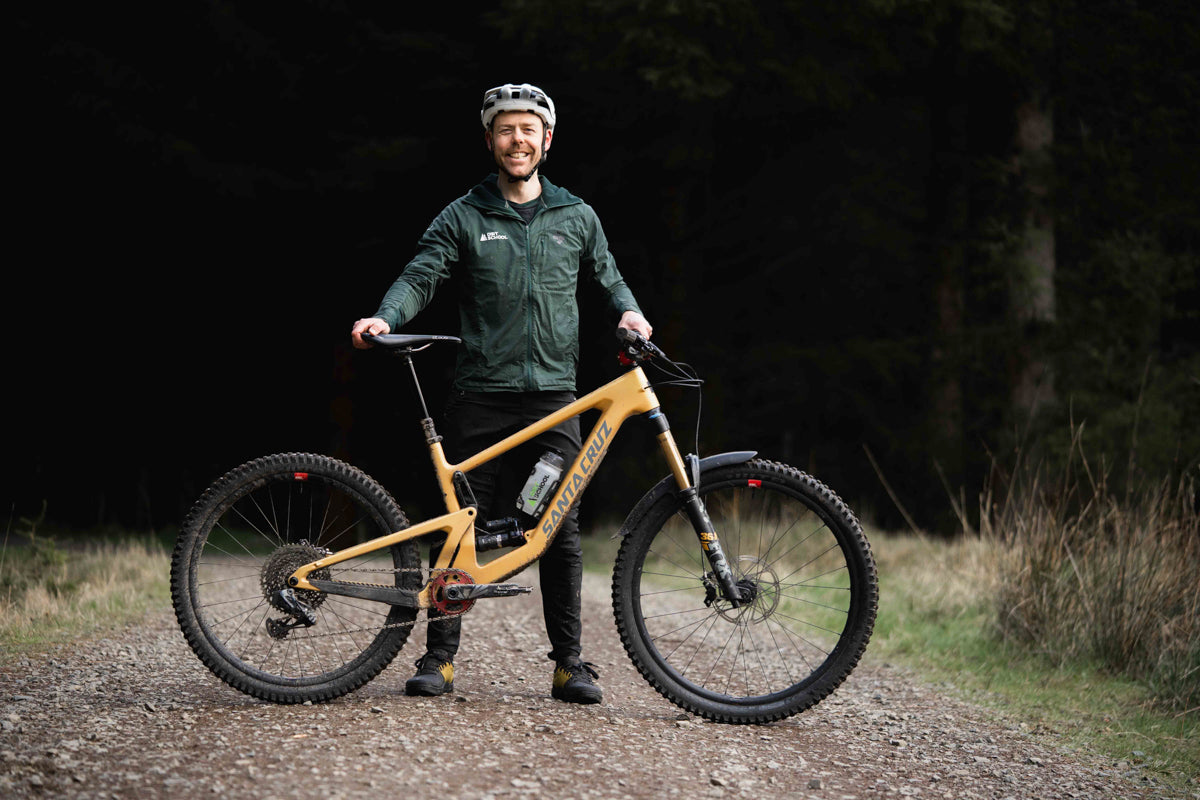 Andy standing with his Santa Cruz Bronson