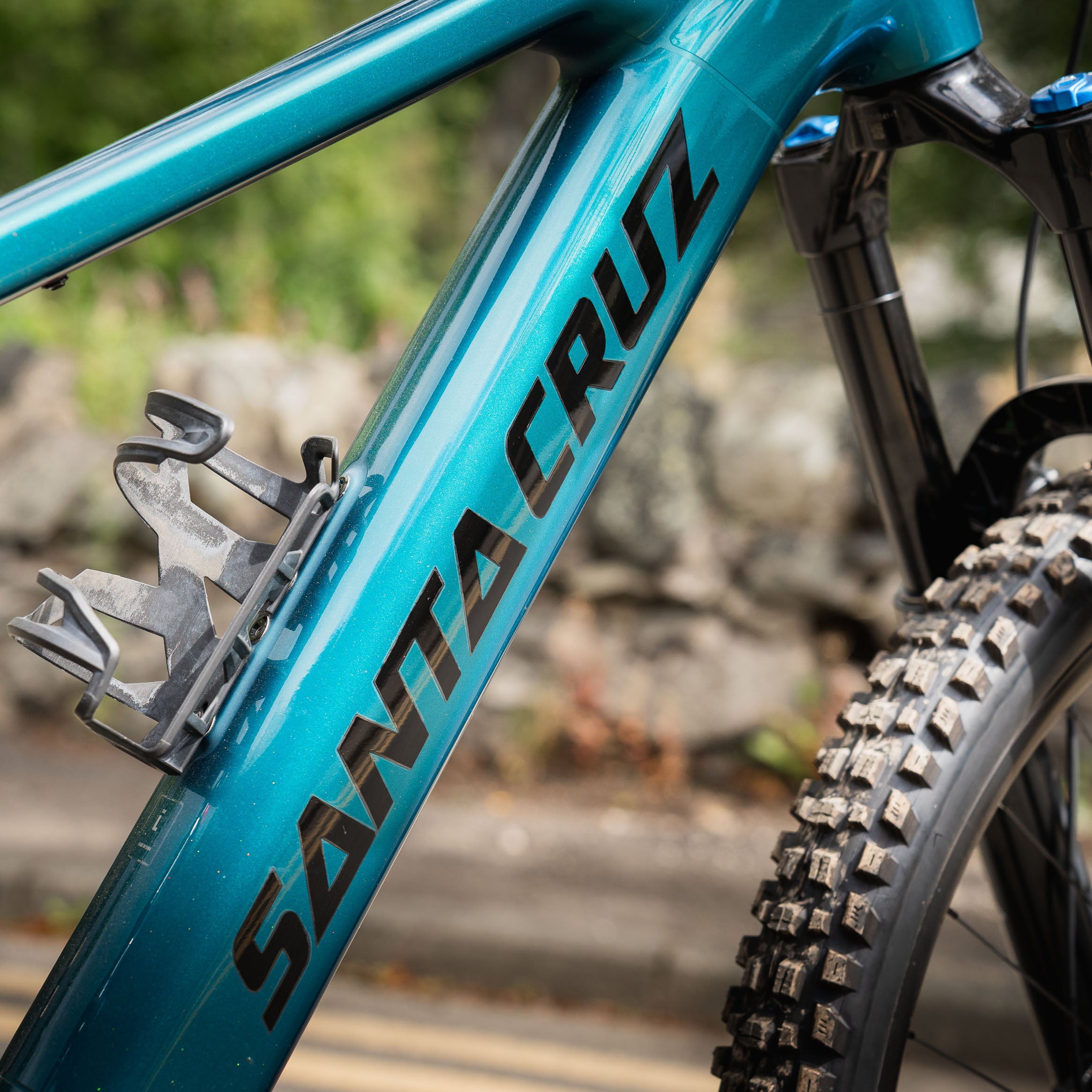 Downtube logo and paint close up on the Matte Teal Bullit